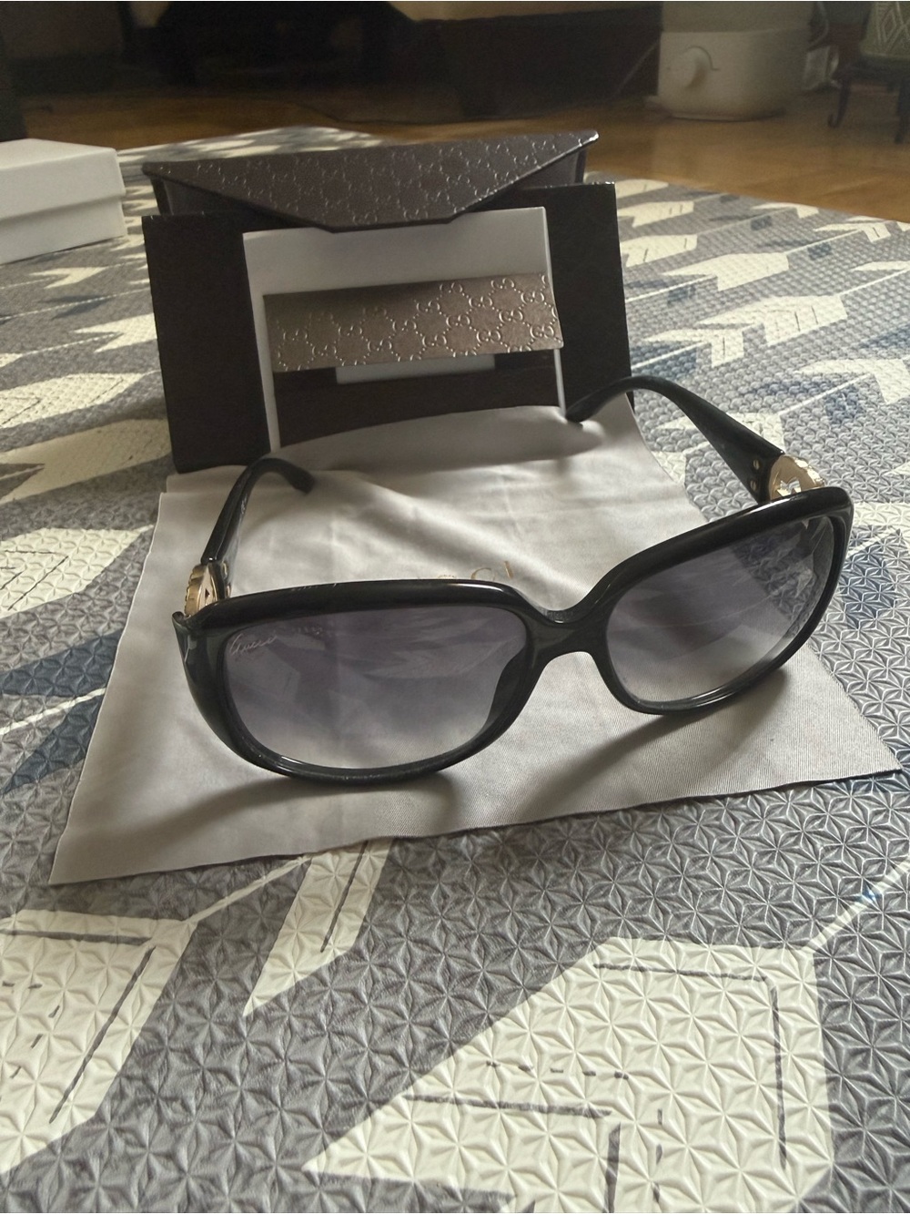 Gucci Black Frame Sunglasses with Gradient Lenses